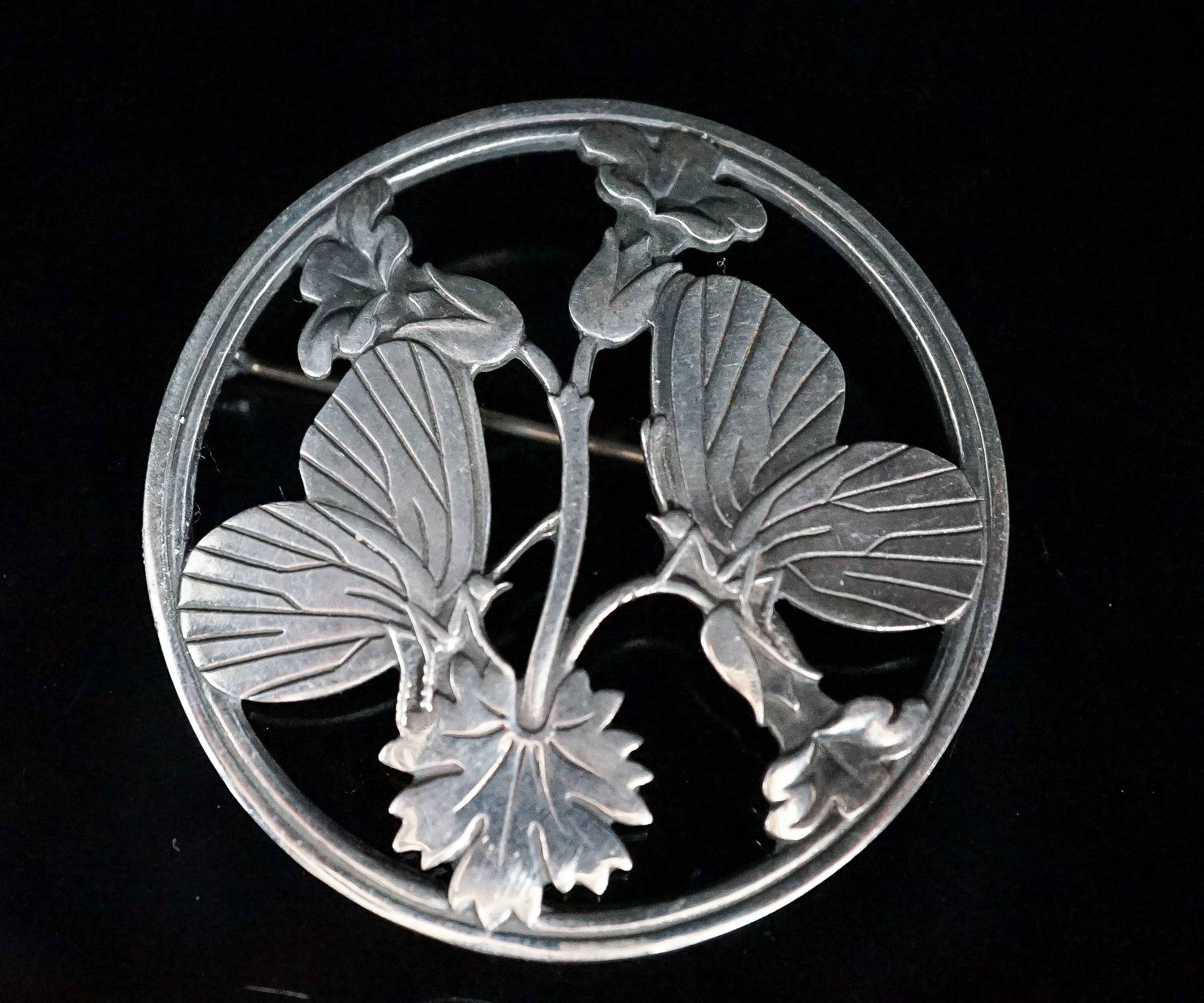 A Georg Jensen sterling circular 'Moonlit Butterfly' brooch, no. 283, 51mm.